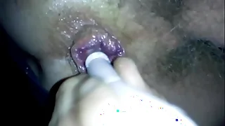 candle inserted alongside ass while peeing alongside thermos